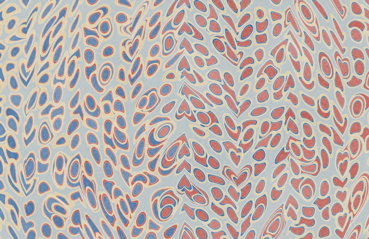 A marbled sheet of combed columns of blue and red drops ringed in sand on a gray-blue ground.